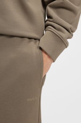 Pantaloni della tuta in terry di cotone con logo a contrasto, Marrone