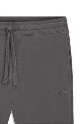 Jogginghose aus Baumwoll-Terry mit kontrastfarbenem Logo, Grau