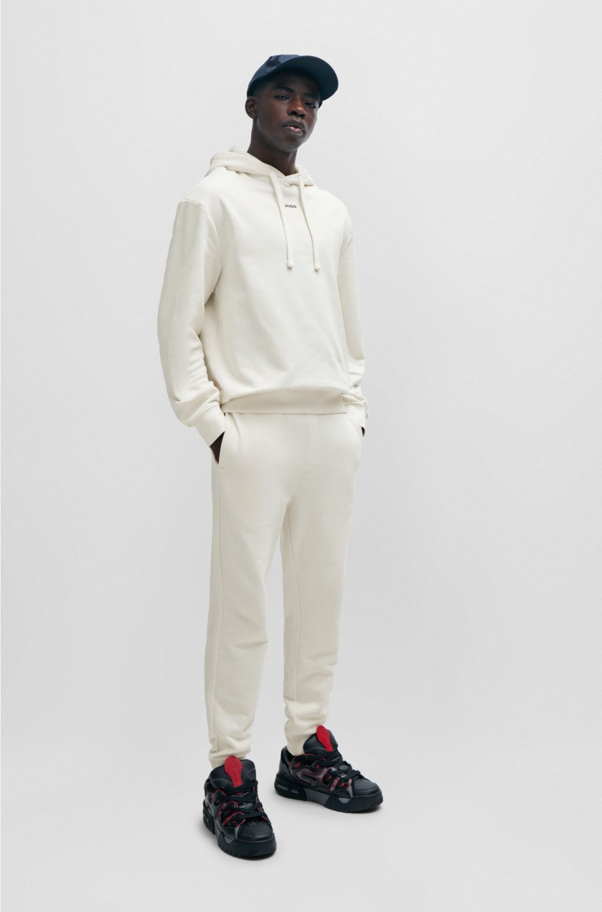 Cotton-terry tracksuit bottoms with logo print, White
