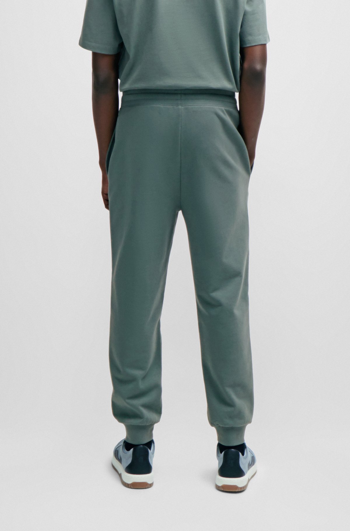 Cotton-terry tracksuit bottoms with logo print, Dark Green