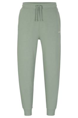 Hugo Boss Cotton-terry Tracksuit Bottoms With Logo Print In Green