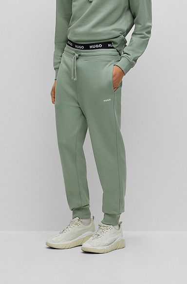 Cotton-terry tracksuit bottoms with logo print, Light Green