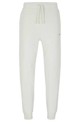 Hugo Boss Cotton-terry Tracksuit Bottoms With Logo Print In Gray