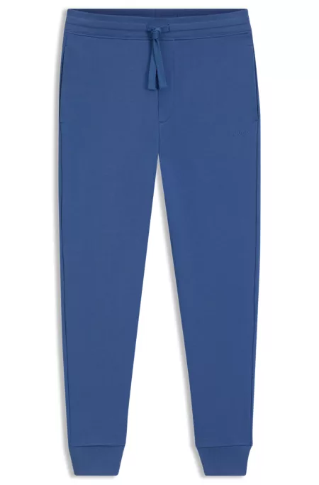Cotton-terry tracksuit bottoms with logo print