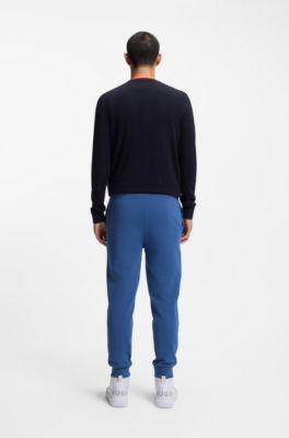 Cuffed tracksuit bottoms in cotton terry with logo print, Blue