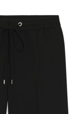 Regular-fit trousers in Japanese crepe, Black