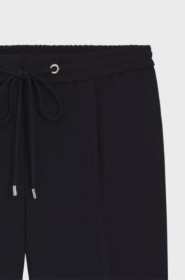 Pantaloni regular fit in cr&ecirc;pe giapponese, Blu scuro