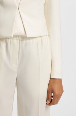 Slim-fit cropped jacket with collarless styling, White