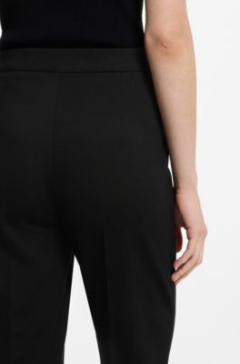 Pantaloni regular fit in tessuto elasticizzato con gamba affusolata, Nero