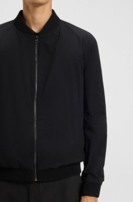 Packable slim-fit jacket with red lining, Black