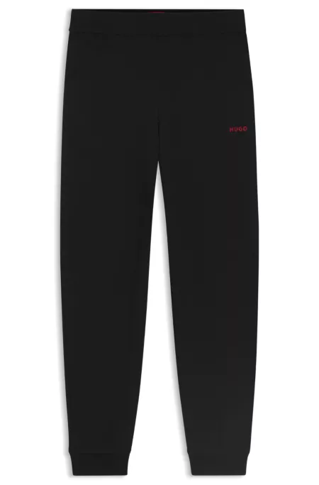 Logo-print tracksuit bottoms in stretch modal and cotton
