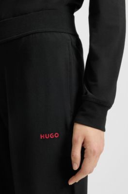 Logo-print tracksuit bottoms in stretch modal and cotton, Black