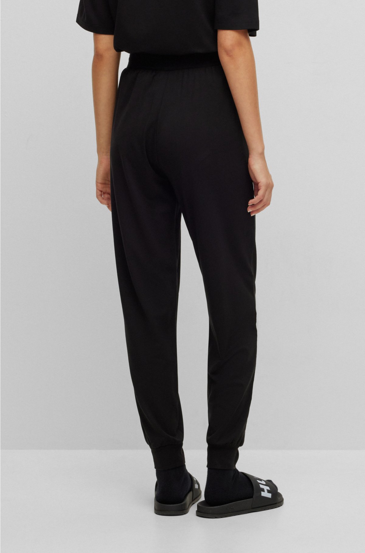 Relaxed-fit tracksuit bottoms with printed logo, Black