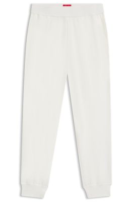 Logo-print tracksuit bottoms in stretch modal and cotton, Natural