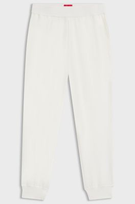 Logo-print tracksuit bottoms in stretch modal and cotton, Natural