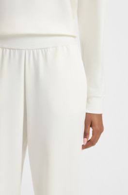 Logo-print tracksuit bottoms in stretch modal and cotton, Natural