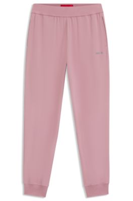 Logo-print tracksuit bottoms in stretch modal and cotton, light pink