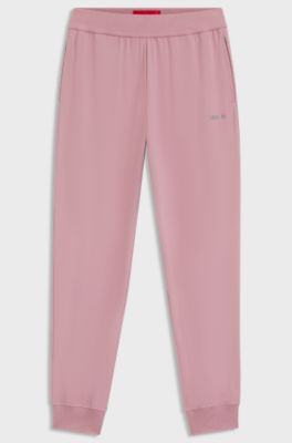 Logo-print tracksuit bottoms in stretch modal and cotton, Light Pink