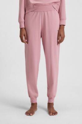 Pantalones de ch&aacute;ndal en algod&oacute;n, modal y el&aacute;stico con logo estampado, Rosa claro