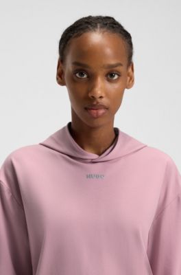 Relaxed-fit hoodie in stretch jersey with logo print, light pink