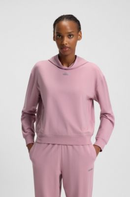 Relaxed-fit hoodie in stretch jersey with logo print, light pink