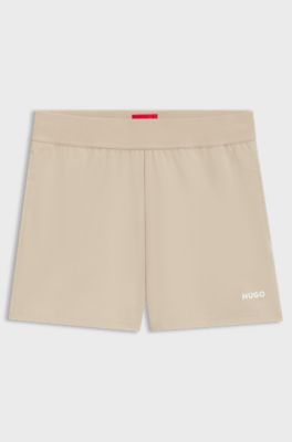 Shorts van stretchmateriaal met logoprint, Lichtbeige