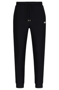 Stretch-jersey tracksuit bottoms with signature-stripe tape, Black
