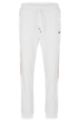 Tracksuit bottoms in active-stretch fabric with side stripes, White