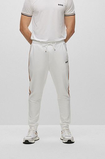 Stretch-jersey tracksuit bottoms with signature-stripe tape, White