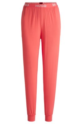 Pyjamabroek van stretchjersey met boorden en logotailleband, Koraal
