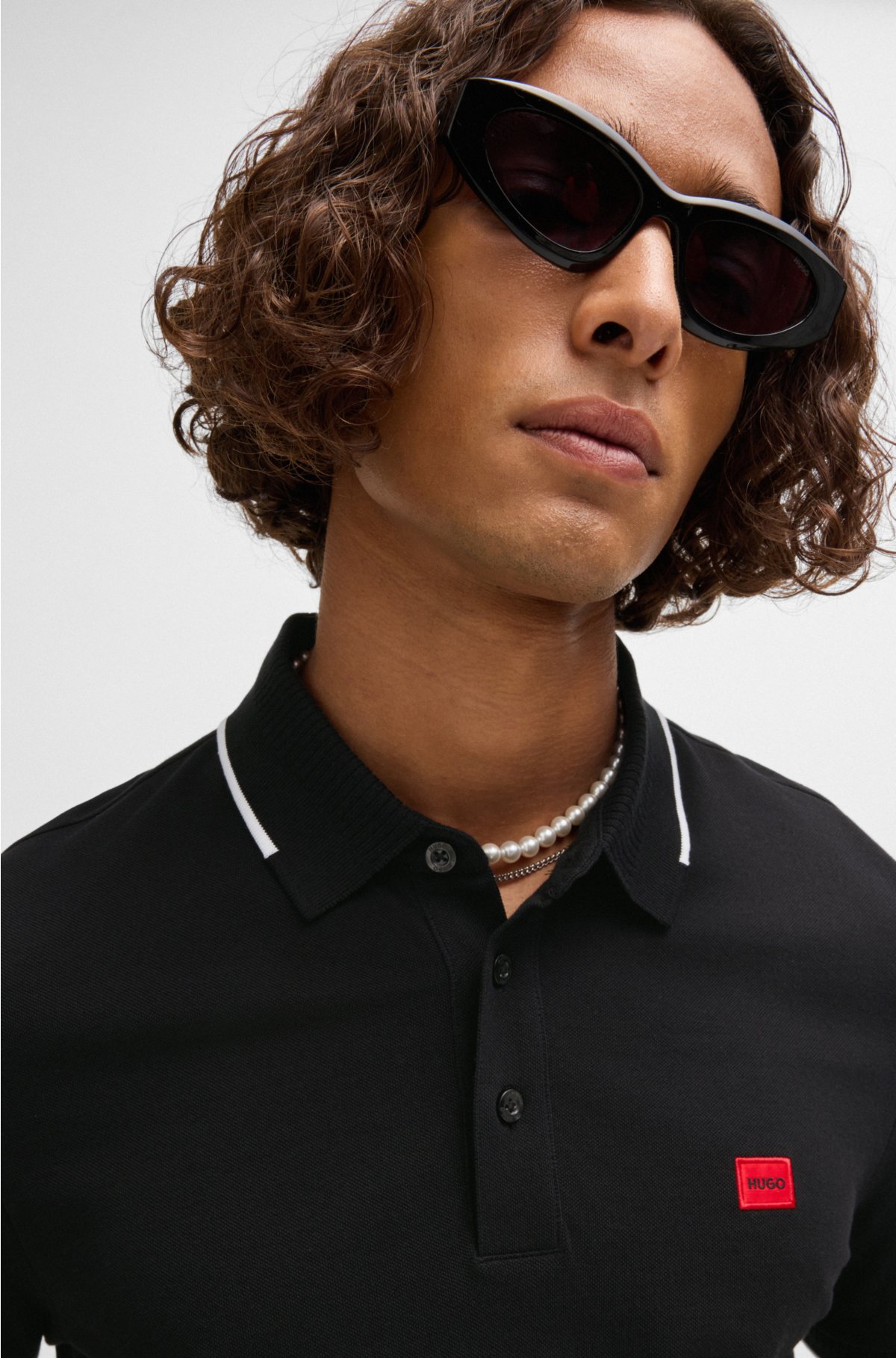 Cotton-piqué slim-fit polo shirt with red logo label, Black