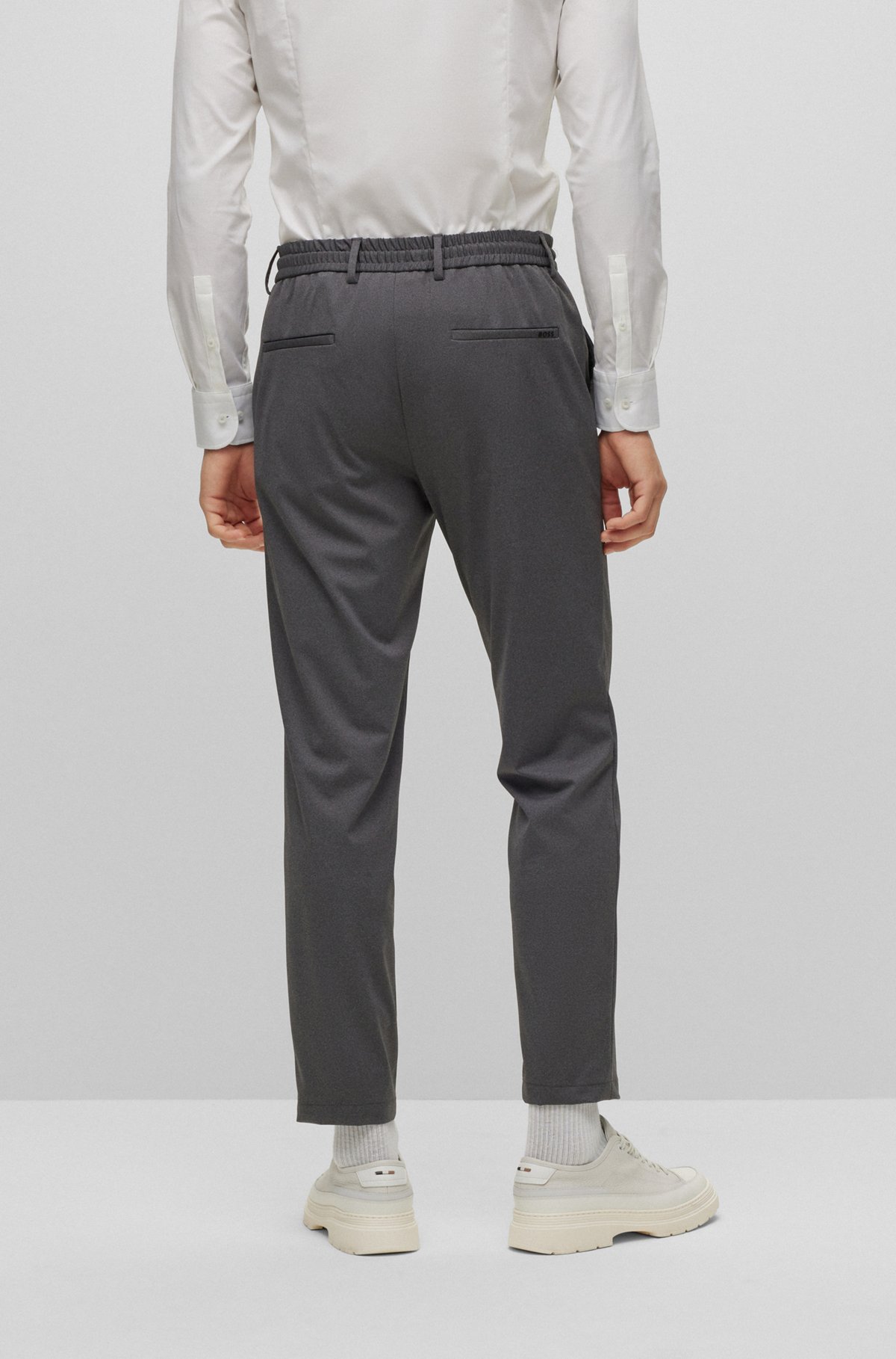 Slim-fit trousers in micro-patterned jersey , Dark Grey