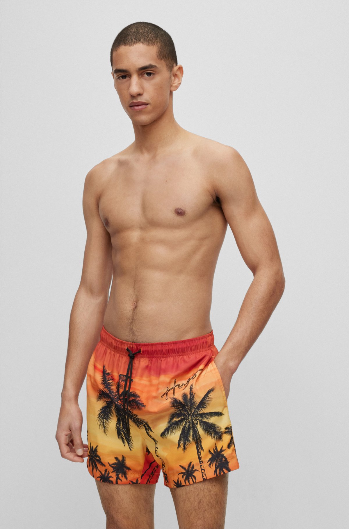 BOSS - Quick-dry swim shorts in recycled fabric with branding