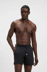 Short de bain avec rayures emblématiques et logo, Noir