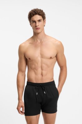 Swim shorts with signature stripe and logo