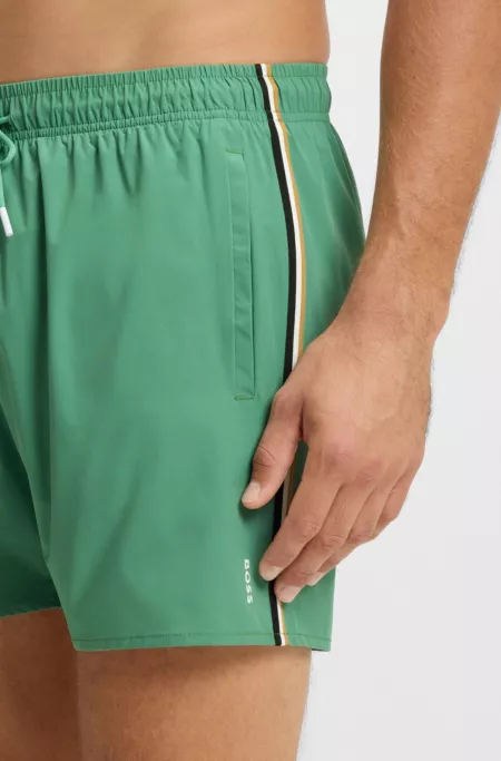 Swim shorts with signature stripe and logo