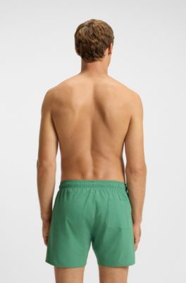 Short de bain avec rayures embl&eacute;matiques et logo, Vert