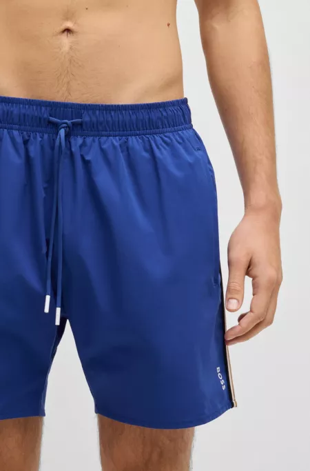 Swim shorts with signature stripe and logo