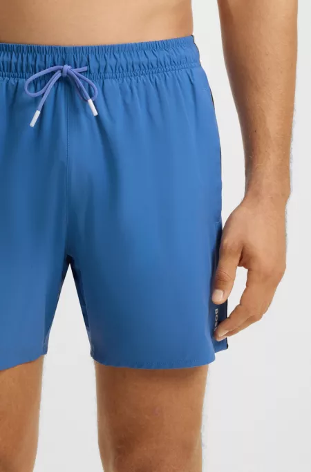 Swim shorts with signature stripe and logo