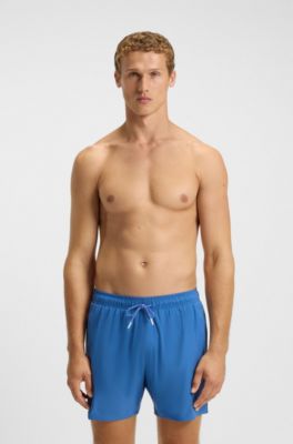 Boxer da mare con righe tipiche del marchio e logo, Blu