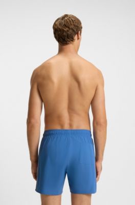 Boxer da mare con righe tipiche del marchio e logo, Blu