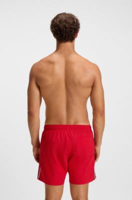Short de bain avec rayures embl&eacute;matiques et logo, Rouge