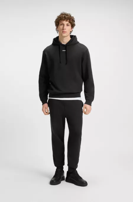 Two-piece relaxed-fit tracksuit with contrast logos