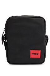 Reporter bag with red rubber logo label, Black