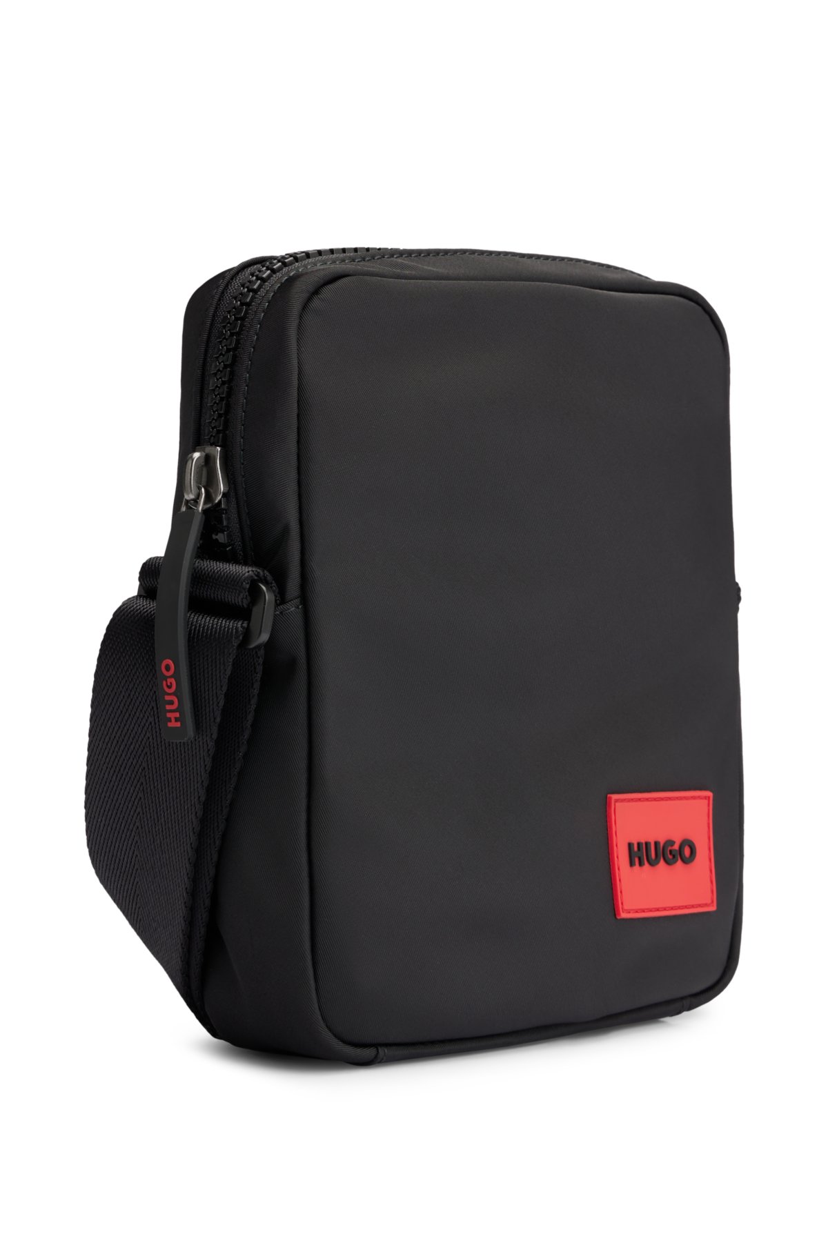 Reporter bag with red rubber logo label, Black