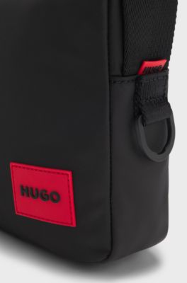 Reporter bag with rubberised logo label, Black