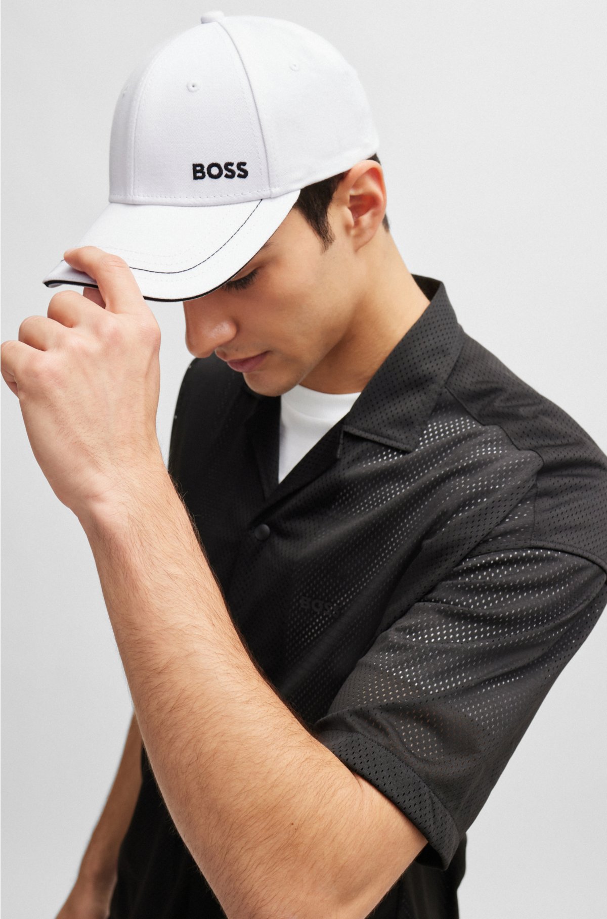 Cotton-twill cap with embroidered logo and metal buckle, White