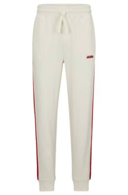 Hugo Cotton-terry Tracksuit Bottoms With Stripes And Logos In Multi ...