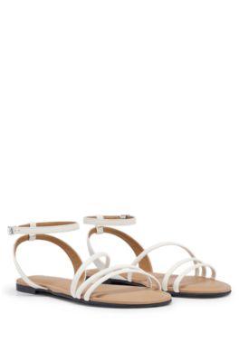 strappy flat white sandals