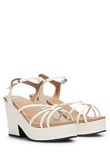 Platform sandals in soft leather with branded buckle, White
